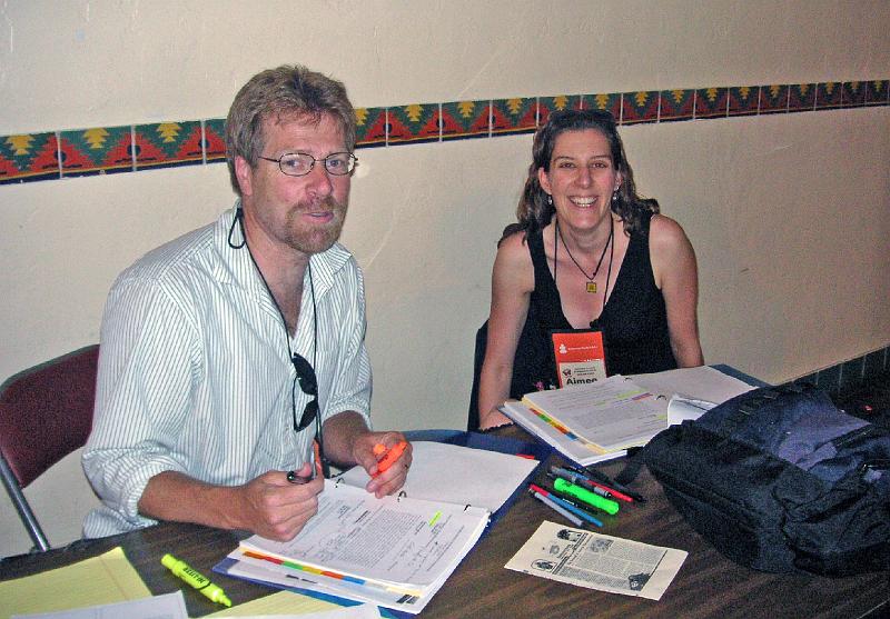 16 - Ken and Aimee.jpg - Revs. Ken Henry and Aimee Moiso plan for the coordination of the two Sunday worship services.